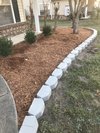Mulch/stone added to flower bed
